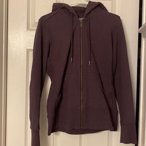 Heavy fabric purple sweatshirt. Size medium. Never worn.